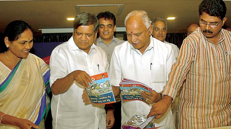 BJP leaders Shobha Karandlaje, Jagadish Shettar,  B.S. Yeddyurappa, and R Ashok release a 63-page chargesheet against the Congress government, in Bengaluru on Thursday  DC