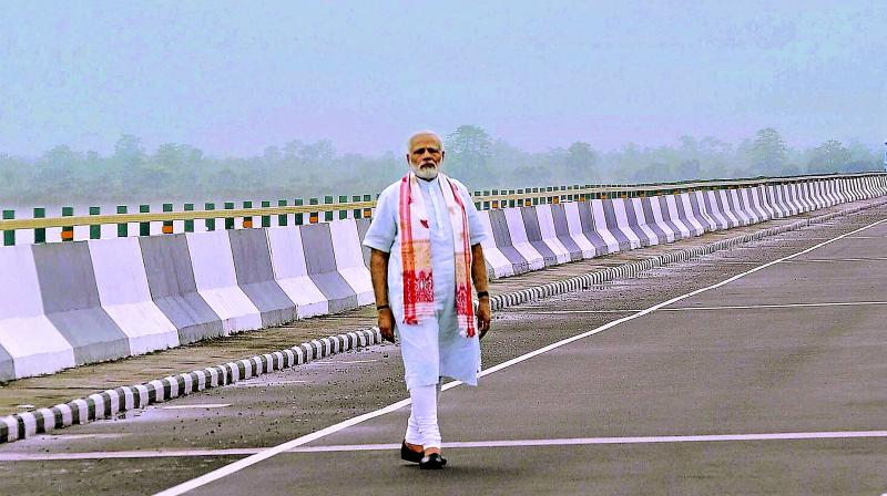 Prime Minister Narendra Modi at the newly inaugurated Dhola-Sadia bridge, the countrys longest river bridge, in Assam on Friday. (Photo: PTI)
