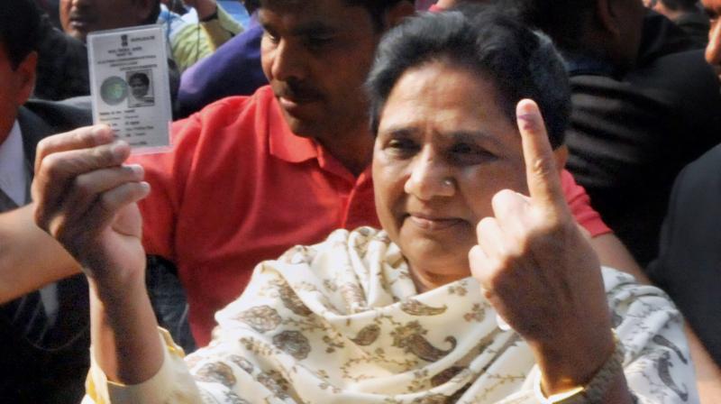 BSP supremo Mayawati shows her inked finger after casting her vote in the third phase of the UP assembly elections in Lucknow. (Photo: PTI)