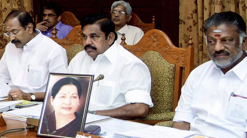 Tamil Nadu Finance Minister O Panneerselvam (right), the senior AIADMK leader who was made the first-among-the-equals in the State Cabinet in Chief Minister J Jayalalithaas absence, chairs the cabinet meeting at the Secretariat in Chennai. (Photo: PTI)
