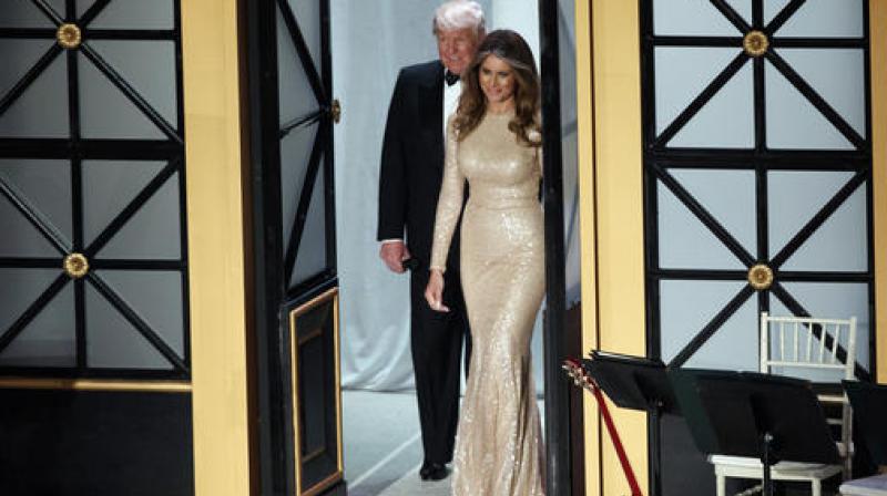 President-elect Donald Trump and his wife Melania arrive to a VIP reception and dinner with donors in Washington. (Photo: AP)