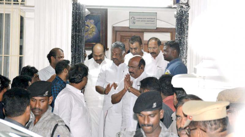 Deputy Chief Minister O. Panneerselvam and senior  minister D. Jayakumar coming out of Karunanidhis  residence at Gopalapuram on Thursday night. (Photo:DC)