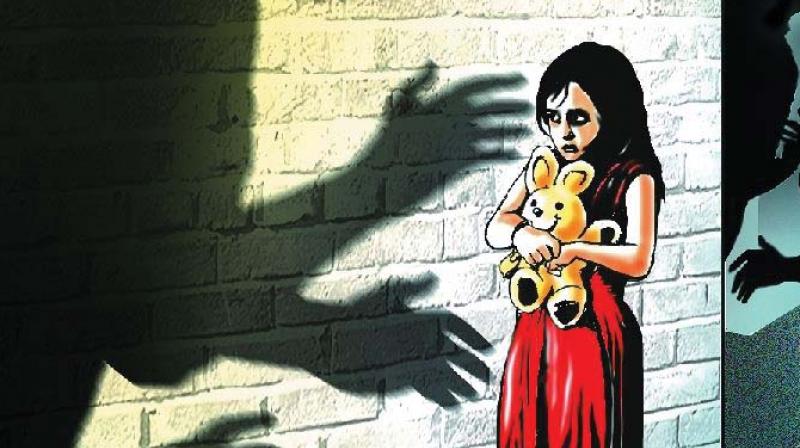 The man, identified as Kiran, has been booked under POCSO Act after his wife along with the parents of the victim approached the police and lodged a complaint.