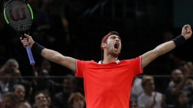 Going into the event, Khachanov had won just three of 19 encounters against players in the top 10 but claimed a fourth such scalp in a week after snapping Djokovics 22-match winning run. (Photo: AP)