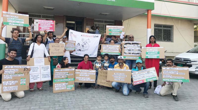 Activists of Citizens For Bengaluru stage protest  in front of the KPCC office in Bengaluru on Sunday  (Image: DC)