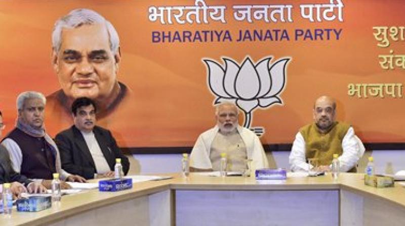 Prime Minister Narendra Modi, BJP President Amit Shah and other leaders at the partys Central Election Committee meeting to discuss the candidates for the forthcoming Punjab State Assembly polls, in New Delhi. (Photo: AP)