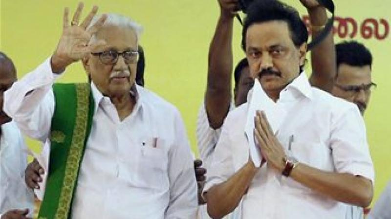 DMKs treasurer MK Stalin with senior leader K Anbazhgan greeting party workers after being elected as the party working president at the General Council Meeting, in Chennai. (Photo: AP)