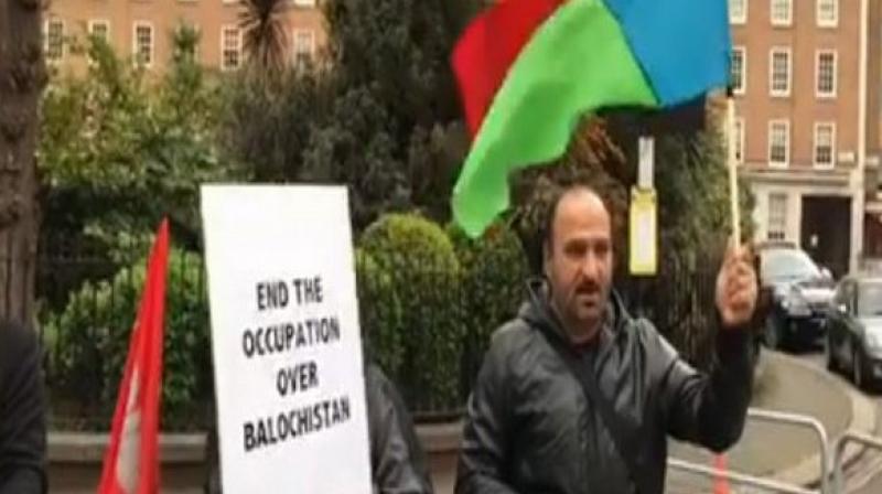 The protesters were seen chanting slogans such as stop Baloch genocide. (Photo: ANI)