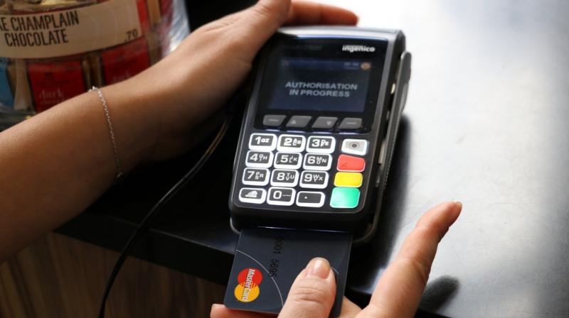 All you need to do is place your authorised finger on the sensor patch of the card while the payment terminal/machine asks for your confirmation for the transaction that you are undertaking. (image: engadget)