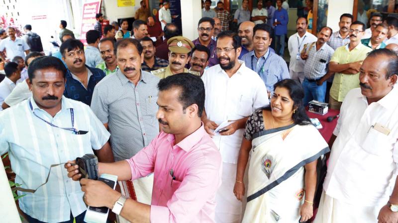 Mayor V.K. Prasanth inaugurates the new portable cameras procured by city corporation for tracking illegal dumping.