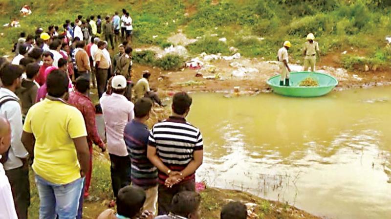 Rescue operation on at a lake in Anekal to fish out the techies body.(Image Dc)
