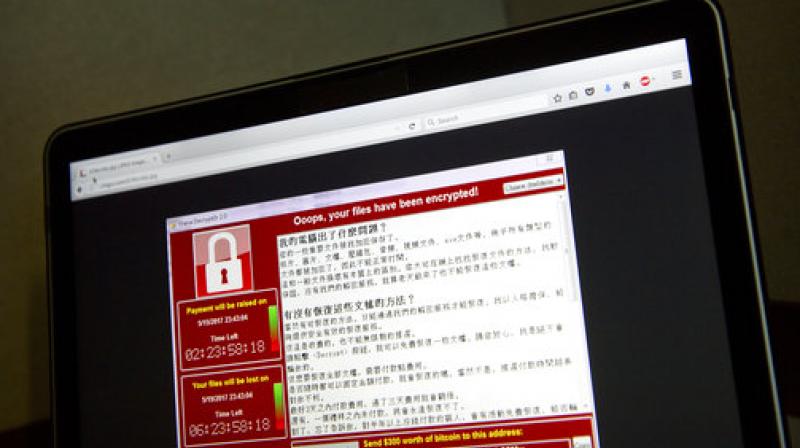 Global cyber chaos is spreading as companies boot up computers at work following the weekends worldwide ransomware cyberattack. (Photo: AP)