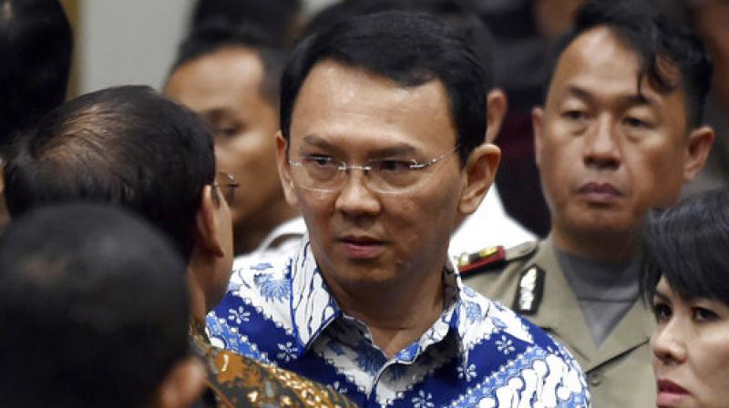 An Indonesian court on Tuesday sentenced the minority Christian governor of Jakarta Basuki Tjahaja Purnama to two years in prison for blaspheming the Quran, a shock decision that undermines the countrys reputation for practicing a moderate form of Islam. (Photo: AP)