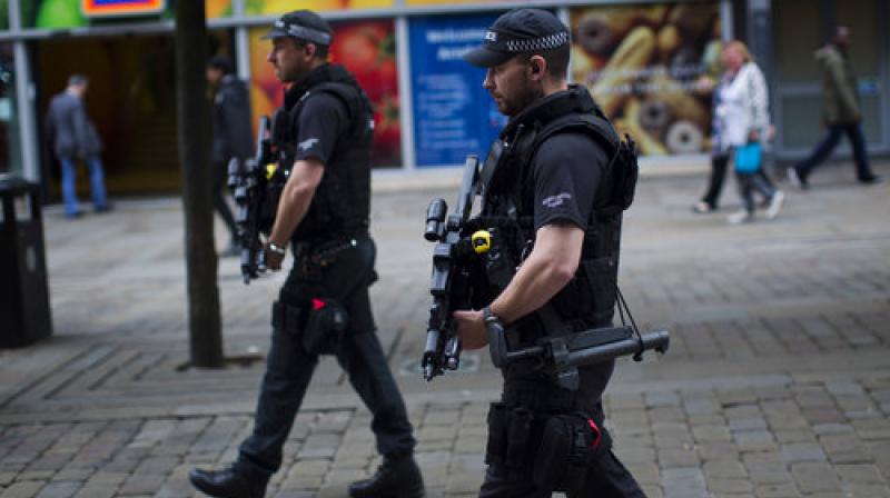 Police officers patrol in central Manchester, Britain, Wednesday, after Mondays suicide attack at an Ariana Grande concert. (Photo: AP)