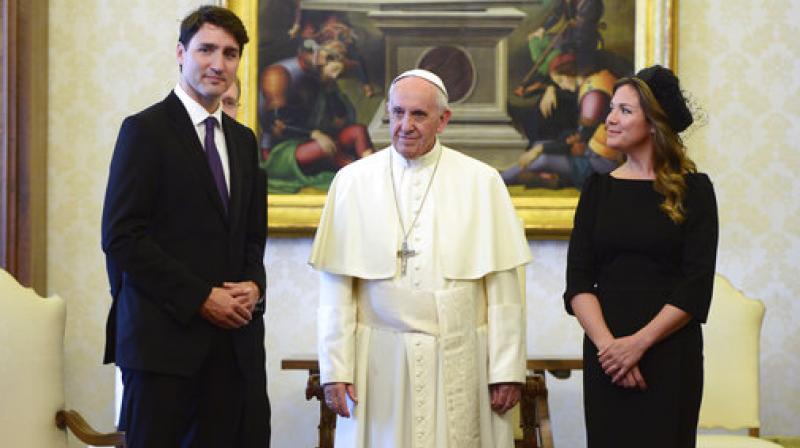 Canadas Prime Minister Justin Trudeau and wife Sophie Gregoire Trudeau meet with Pope Francis for a private audience at the Vatican. (Photo: AP)