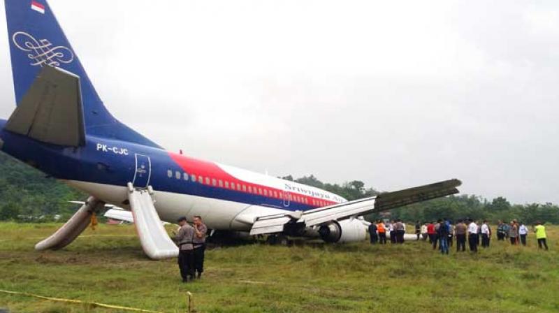 No one was hurt after the Sriwijaya Air plane overshot the wet runway. (Photo: AFP)