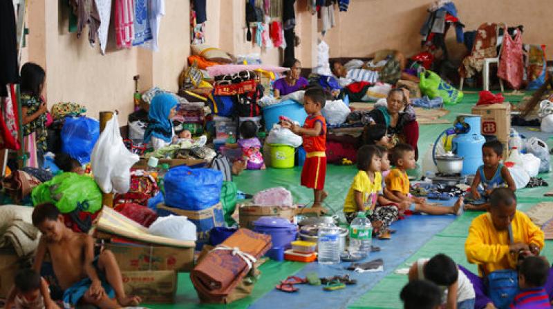 Displaced residents of Marawi city rest in an evacuation center in Balo-i township, Lanao del Norte province in southern Philippines. Tens of thousands of residents are now housed in different evacuation centers as government troops continue to fight Muslim militants in Marawi city. (Photo: AP)