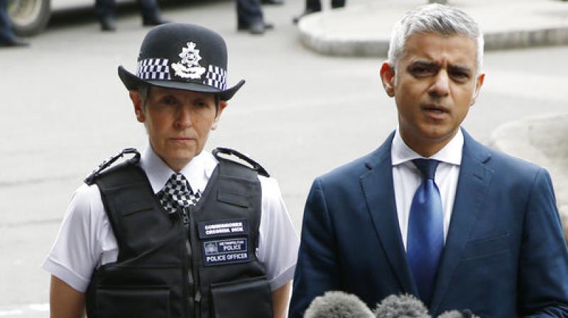 London Police Commissioner Cressida Dick, left, and the Mayor of London Sadiq Khan, participate in a media conference at London Bridge in London. (Photo: AP)