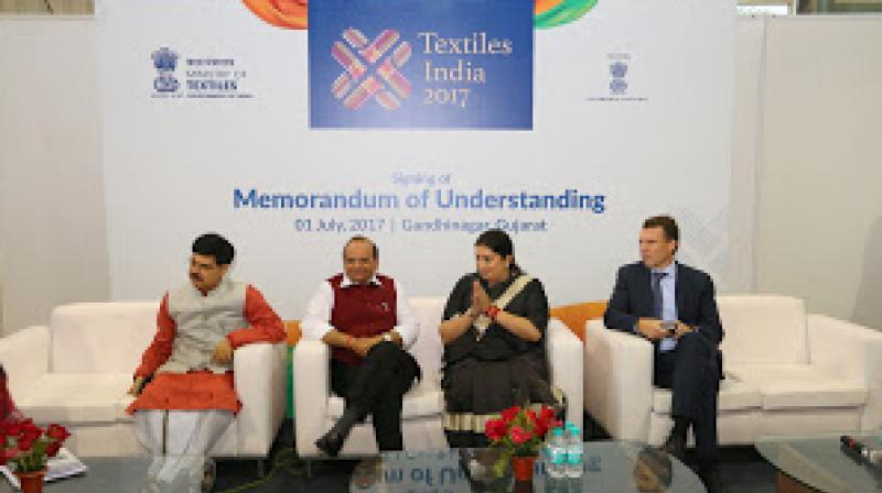 Union Minister Smriti Irani at the Textile India 2017 event with other eminent personalities. Credit: PIB.