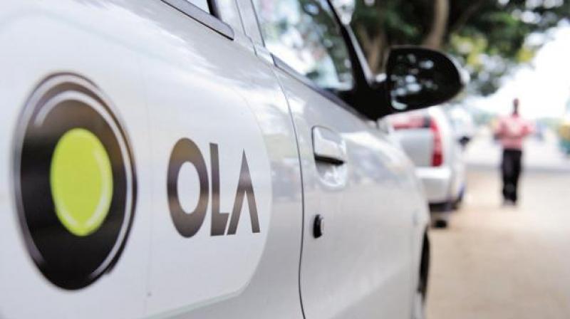 Ola on Monday secured USD 2 billion in new funding from a group of investors, including SoftBank Group Corp and Tencent Holdings Ltd. Photo: PTI