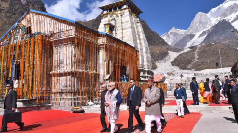 Offering prayers at the Kedarnath shrine, a day before it closes for the winters, Prime Minister Narendra Modi said his visit to the Himalayan temple had strengthened his resolve to serve the nation. (Photo: PTI)