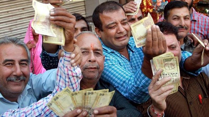 Demonetisation has helped flush out black money, eliminate fake notes and reduce the currency in circulation, said the finance ministry. (Photo: PTI)