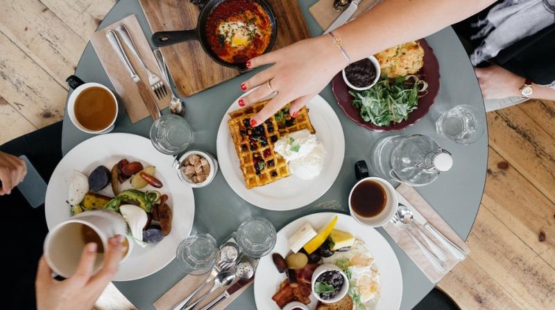 Eating out will get cheaper from Wednesday as the GST Council has slashed rates on food served in AC and non AC restaurants to 5 per cent. (Photo: Pixabay)