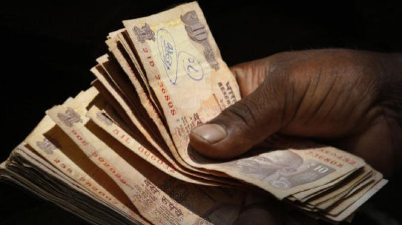 The rupee on Thursday spurted 12 paise to 64.80 against the US currency. (Photo: AP)