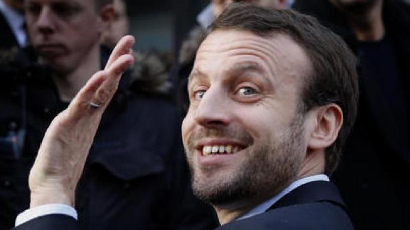 With Macron topping the first round of the French presidential election, projections show that he is set to face Front Nationals Marine Le Pen in a race that has knocked Frances traditional political parties out of the running. (Photo: AP/File)