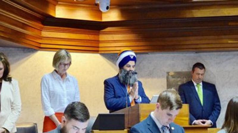 Eminent community leader and chairman of Sikhs political affairs committee Gurinder Singh Khalsa started the senate session with a Sikh prayer. (Photo: AP)