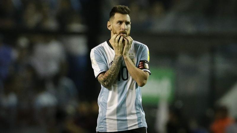 Lionel Messi has identified Spain as the one country he hopes to avoid in the group stages of the World Cup finals next year. (Photo: AP)