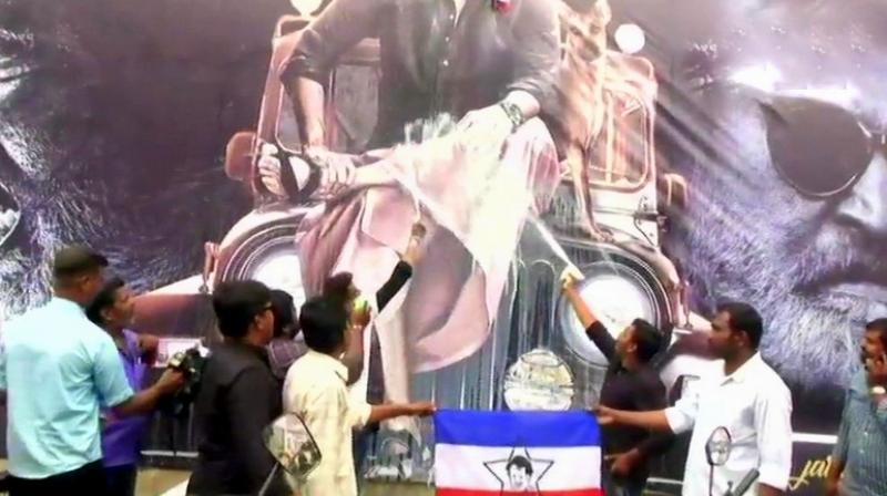 In Chennai, Rajinikanths fans offered milk to the actors poster, burst crackers as they gather in large numbers to watch Kaala. (Photo: ANI | Twitter)