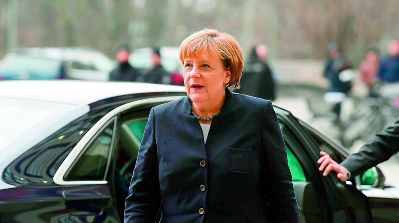 German Chancellor Angela Merkel at Berlin offices of the Federal Criminal Police for investigation of the attack.