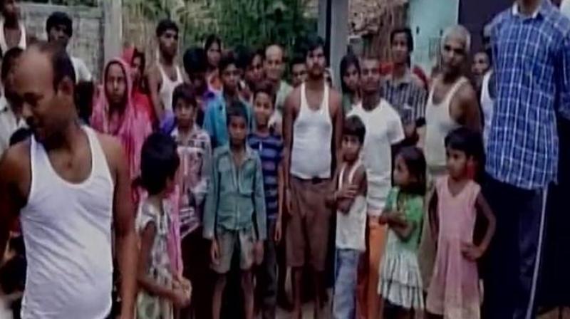Two minor sisters allegedly stripped by school authorities in Begusarai after their father failed to pay school fee. (Photo: ANI/Twitter)