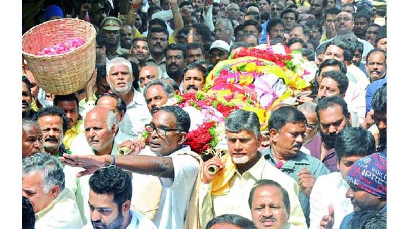 Andhra Pradesh Chief Minister N. Chandrababu  Naidu and former Supreme Court Justice J. Chelameswar Rao and others  carry Nadamuri Harikrishnas body for the  final  rites from  his residence  in Mehdipatnam to Maha Prasthanam in Jubilee Hills.