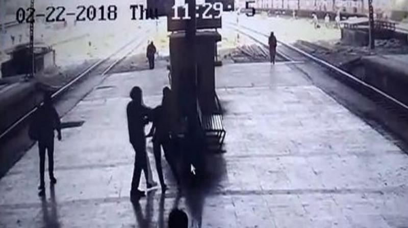 ASI DK Sharma, while analysing the CCTV footage, noticed that at about 11:25 am a man hugged a lady passenger. On suspicion, he immediately directed two officials to reach the spot. (Photo: ANI)