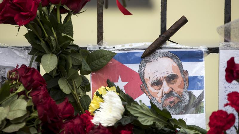 Flowers, candles and a Cuban cigar are displayed in memory of Cuban President Fidel Castro, who died on Friday. (Photo: AP)