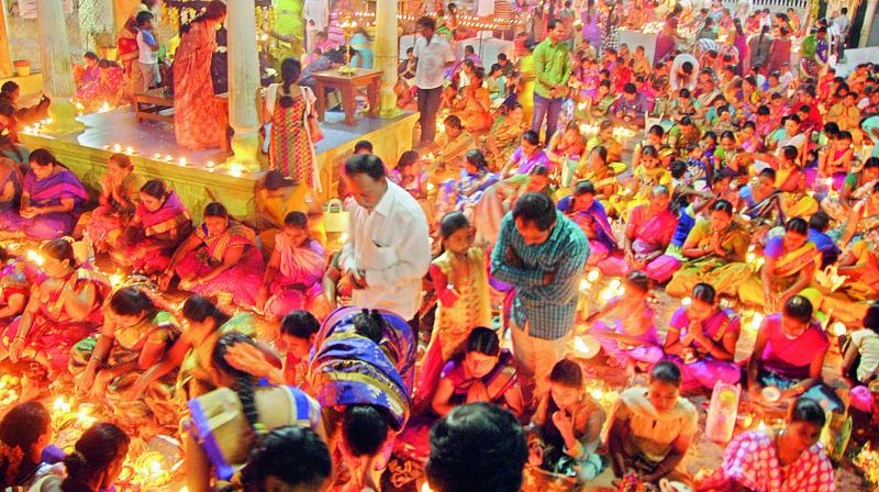 Large number of devotees throng 1st Road Sivalayam in Anantapur on Sunday to perform  Laksha Deeparchana to mark holy Karthika masam. (Photo: DC)