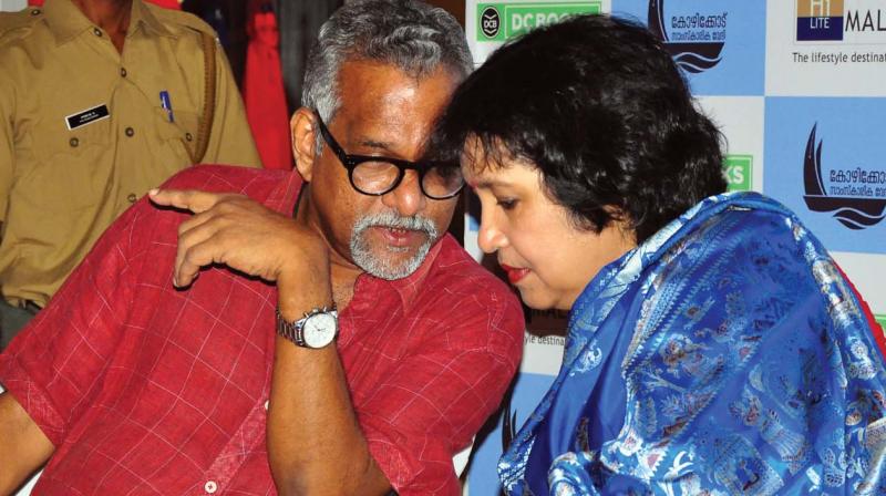 Taslima Nasrin interacts with author T.P. Rajeevan during the release function of her book Spilt: A Life held at Hilite Mall, Kozhikode, on Saturday. (Photo: DC)