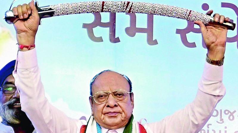 Leader of opposition in Gujarat assembly Shankarsinh Vaghela at a public meeting with his supporters on his 77th birthday, where he announced he was expelled from the Congress, in Gandhinagar on Friday. (Photo: PTI)