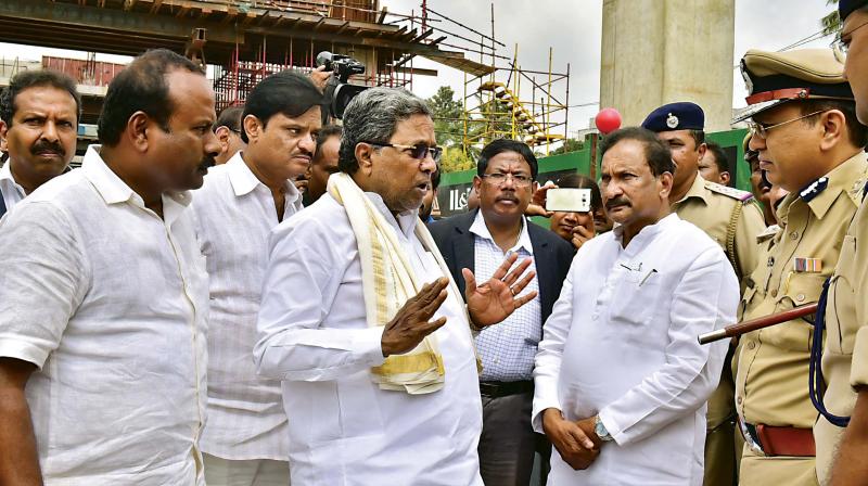 CM Siddaramaiah visited Mysuru Road and other potholed areas in the city on Monday. (Photo: DC)