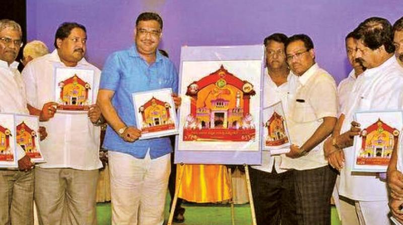 A file photo Primary and secondary education minister Tanveer Sait releasing logo of 82nd Kannada Sahitya Sammelana in Raichur.