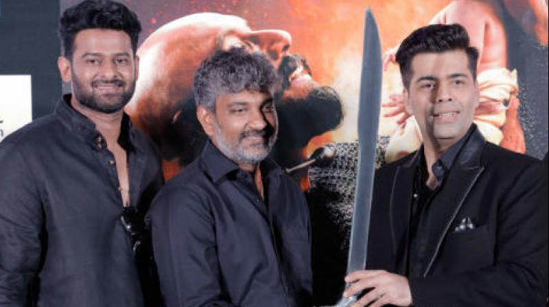 Prabhas, Rajamouli and Karan Johar at the trailer launch of Baahubali: The Conclusion.