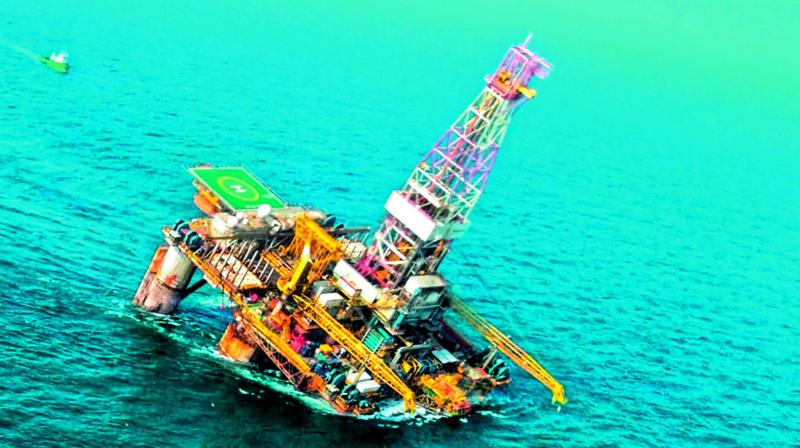 ONGCs oil rig, Olinda Star at KG Basin near Kakinada, was tilted due to Cyclone Phethai on Friday.