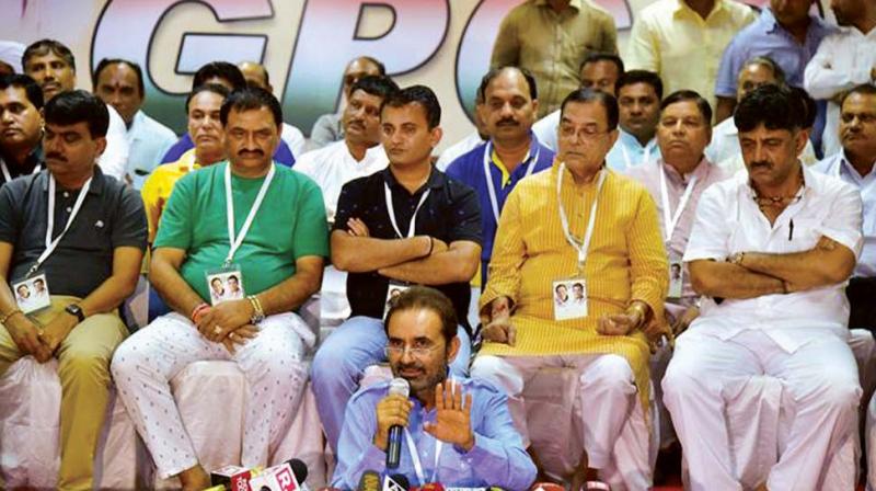 A file photograph of Energy Minister D.K. Shivakumar with Gujarat MLAS at a city resort.