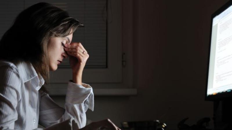 Previous research has suggested that women suffer from work-related stress more than men (Photo: AFP)