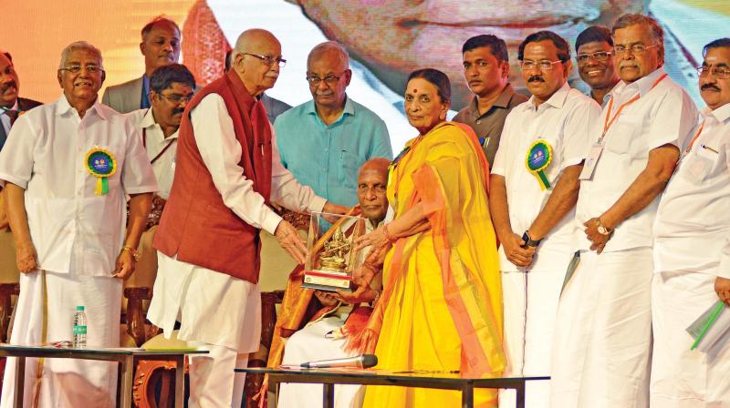 Former Deputy Prime Minister L.K. Advani presents a memento to K. Narayan Rao during the platinum jubilee celebrations of Jaigopal Garodia National Higher Secondary School, Tambaram on Tuesday. Minister for Tamil official language, Tamil culture and archaeology minister K. Pandiarajan and Rajya Sabha Member Ela Ganesan also seen. (Photo: DC)