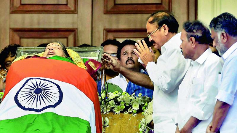 Union Minister Venkaiah Naidu pays his last respects to former chief minister Jayalalithaa. (Photo: PTI)
