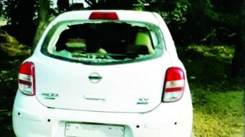 One of the cars which were damaged by drunk BTech students at Beeramguda on Monday night. (Photo: DC)
