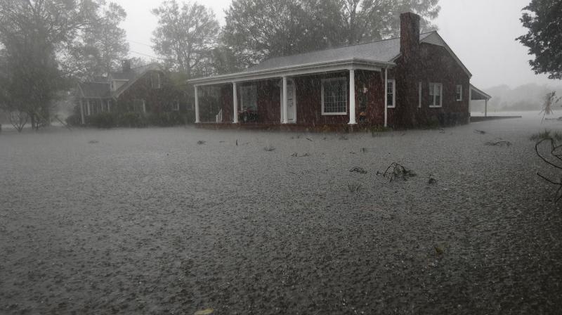 Rivers are swelling toward record levels, forecasters now warn, and thousands of people have been ordered to evacuate for fear that the next few days could bring the most destructive round of flooding in North Carolina history. (Photo: AP)